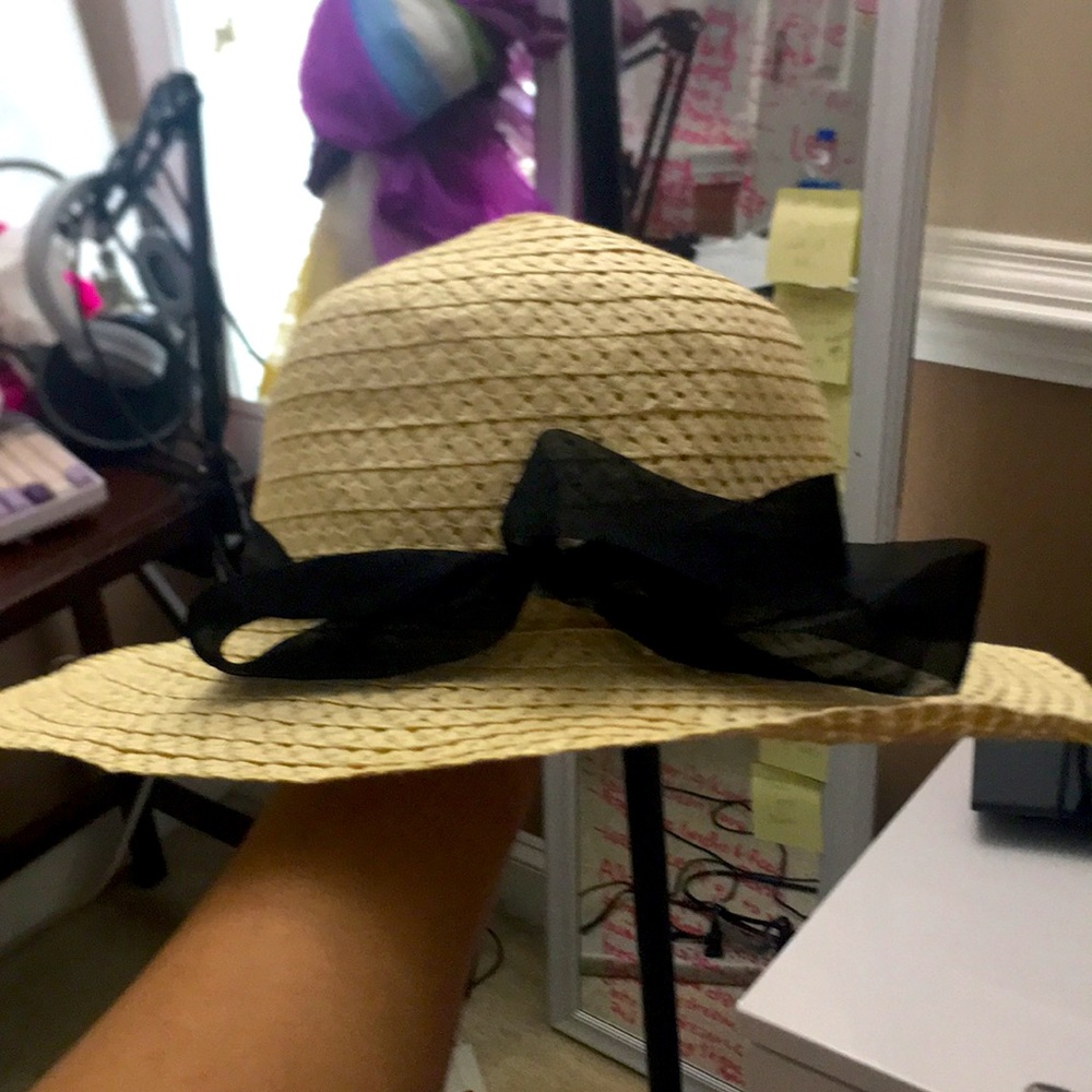 Hat with black ribbon